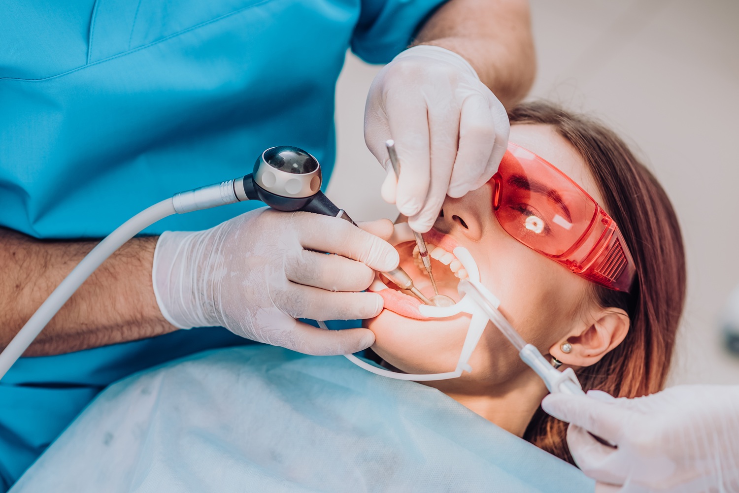dentist doing dental filling procedure