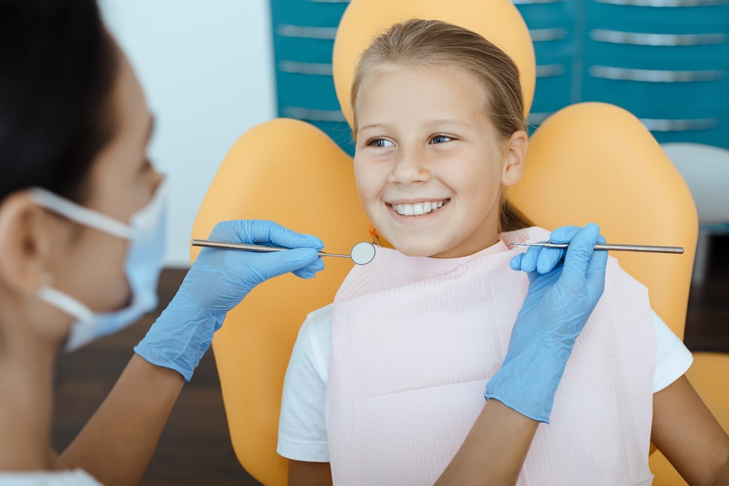 A young girl having its first dental checkup